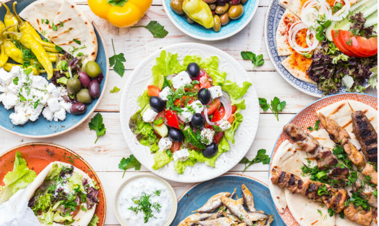 Greek salad, grilled chicken souvlaki skewers, and oven-roasted lemon potatoes catering platter from Acropolis Gyro Corner in Scarborough